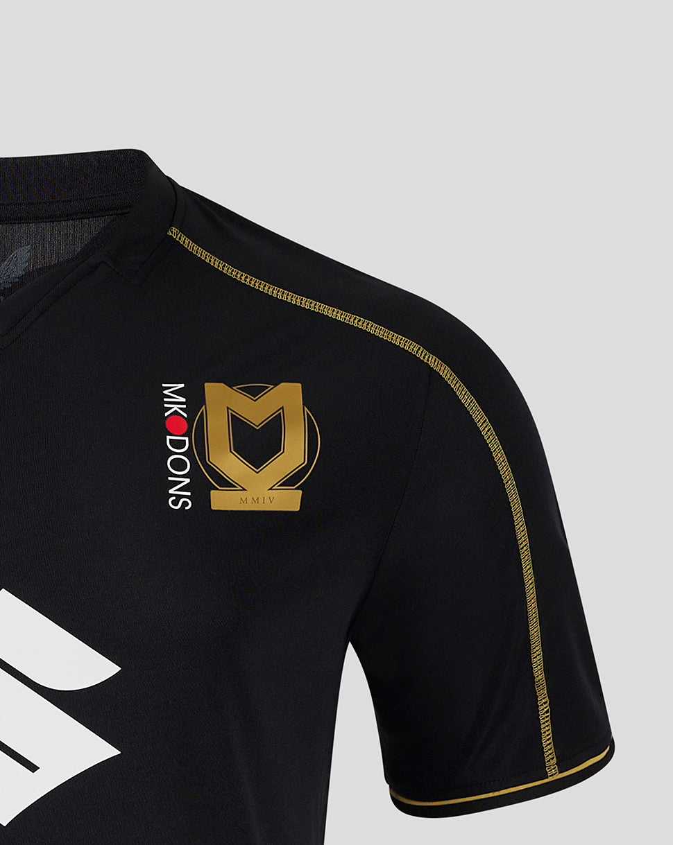 Mk Dons men's 24/25 third shirt black with gold crest on the chest and gold shoulder piping