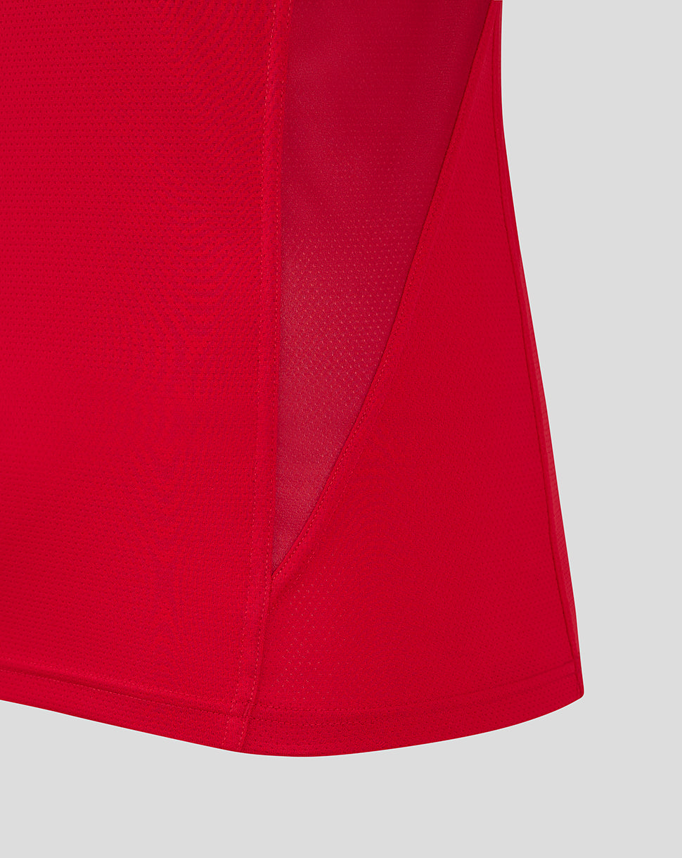 Close up of Scarlets red training vest showing textured mesh and side panel seam