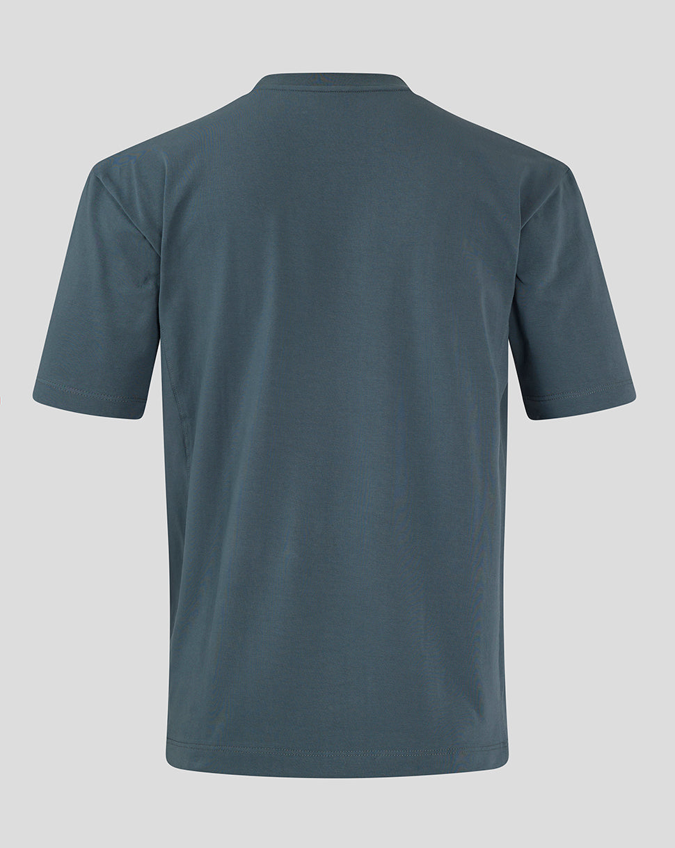 Back view of Preston NE Travel Short Sleeve T Shirt in blue with a relaxed oversized fit.