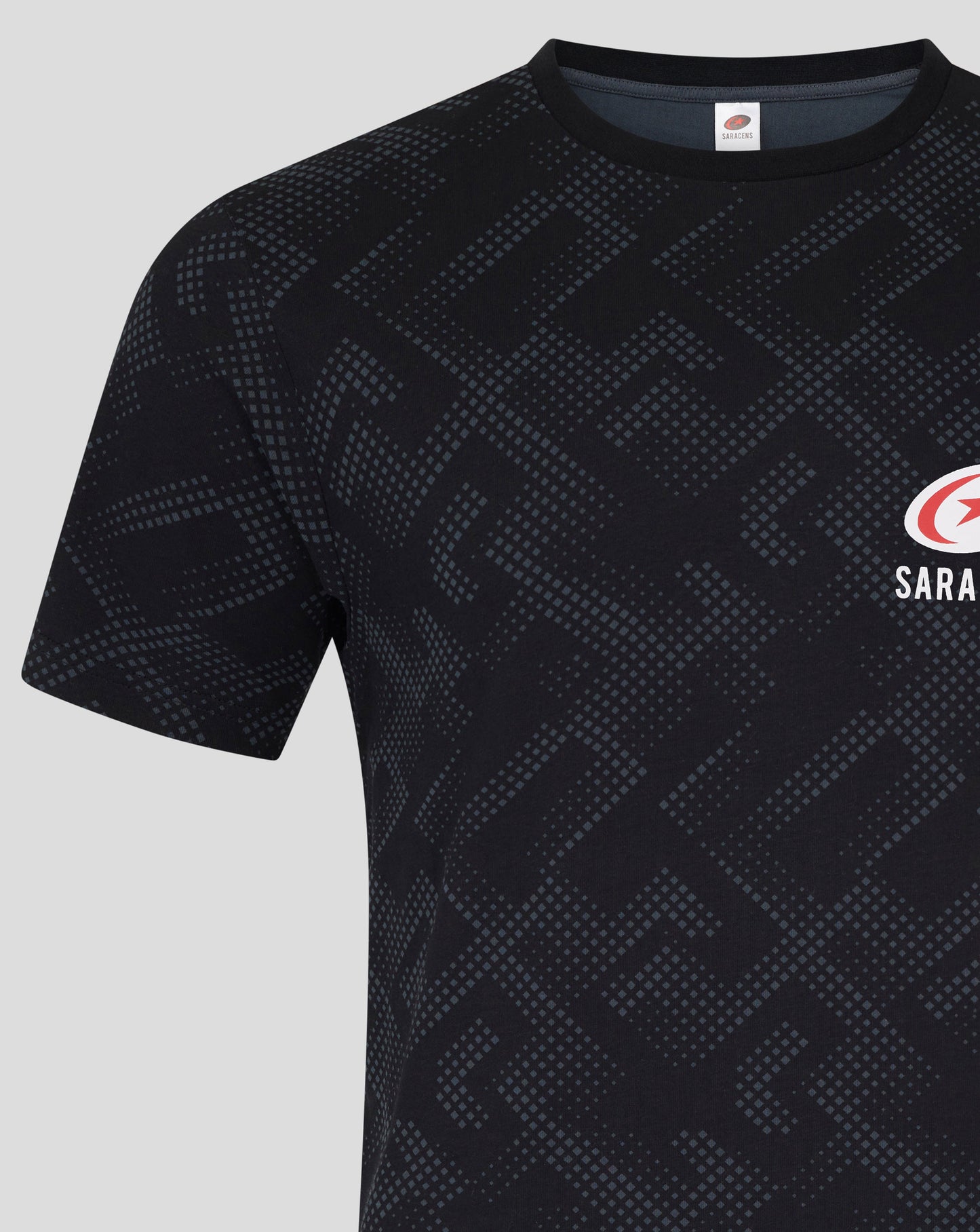 Front view of black navy Saracens T shirt with geometric pattern and logo at the lower right.