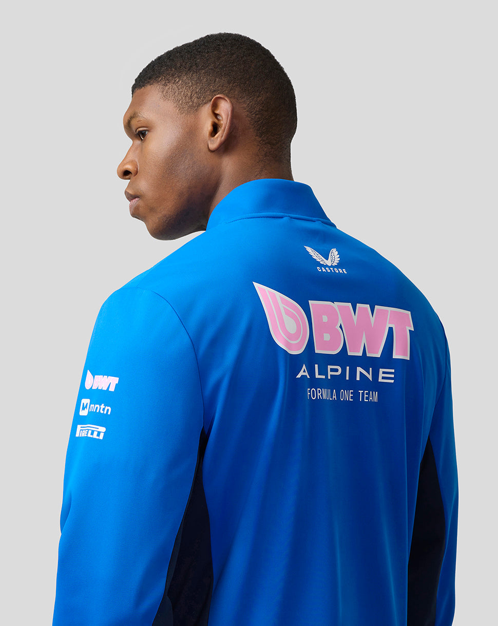 Rear view of lapis blue BWT Alpine Formula One Team unisex soft shell jacket with sponsor logos.