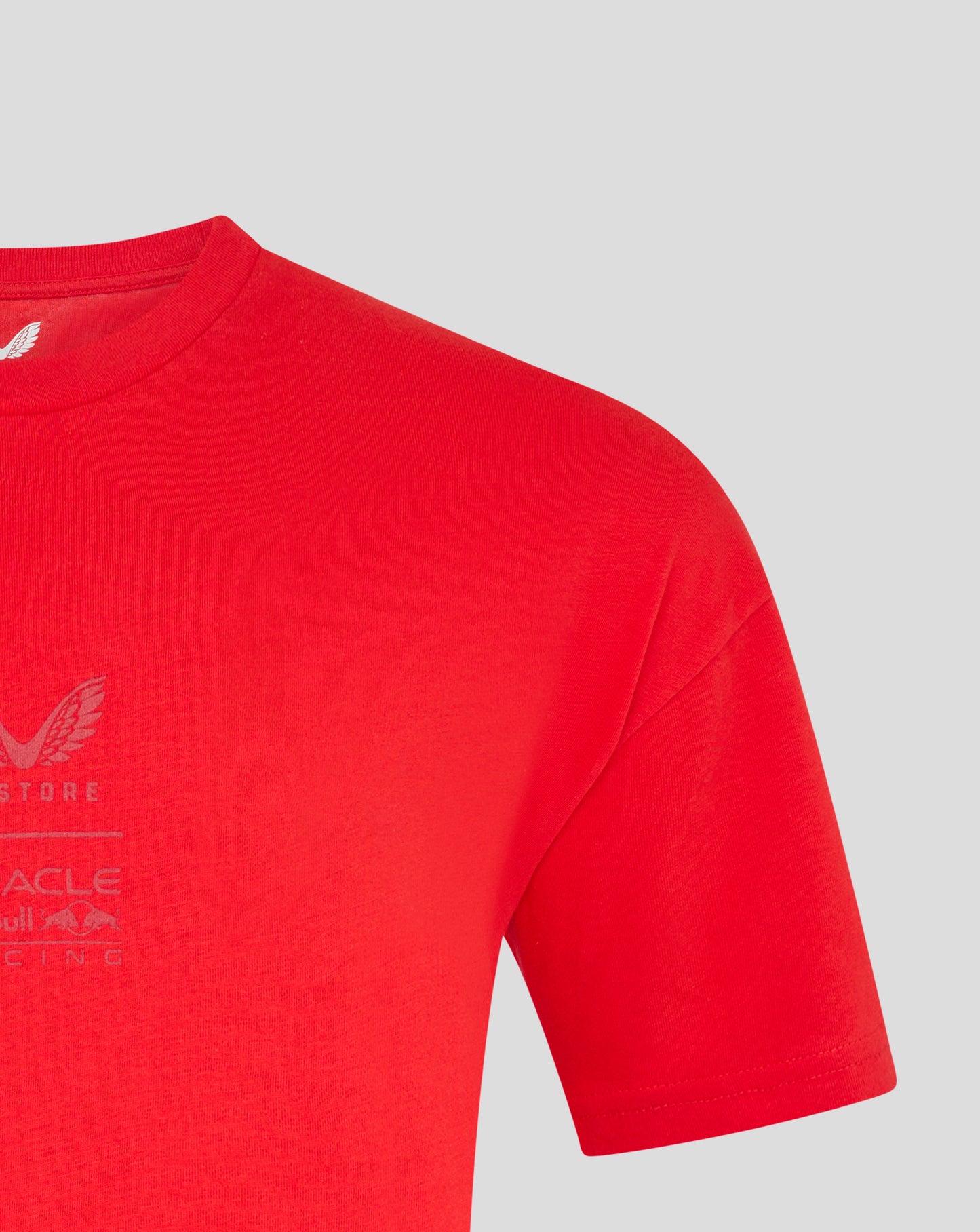 Partial view of flame scarlet Oracle Red Bull Racing oversized T-shirt focusing on shoulder and neckline.