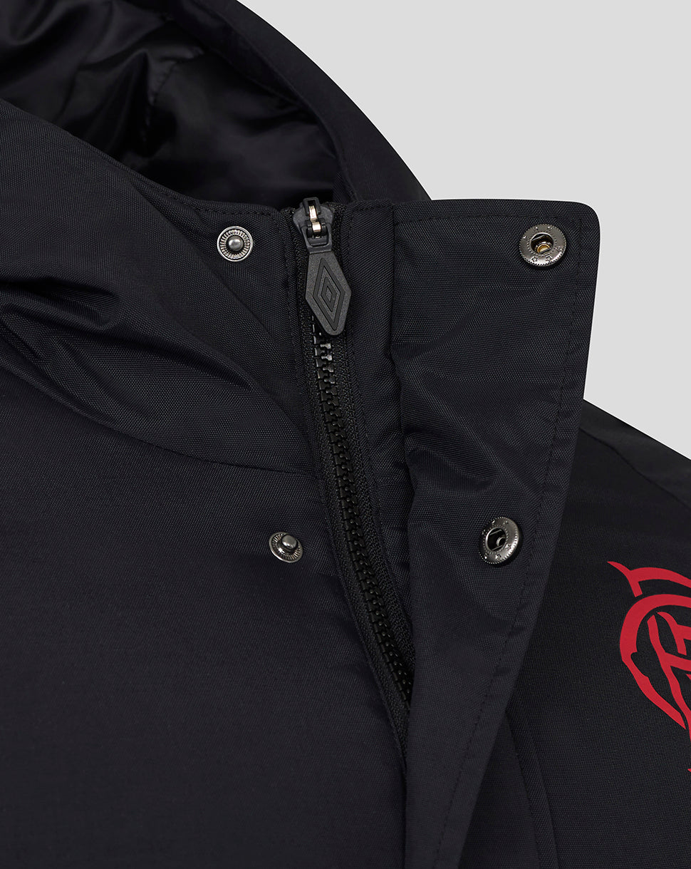 Close-up of front zipper and snap buttons on Rangers Travel Bench Jacket in black fabric