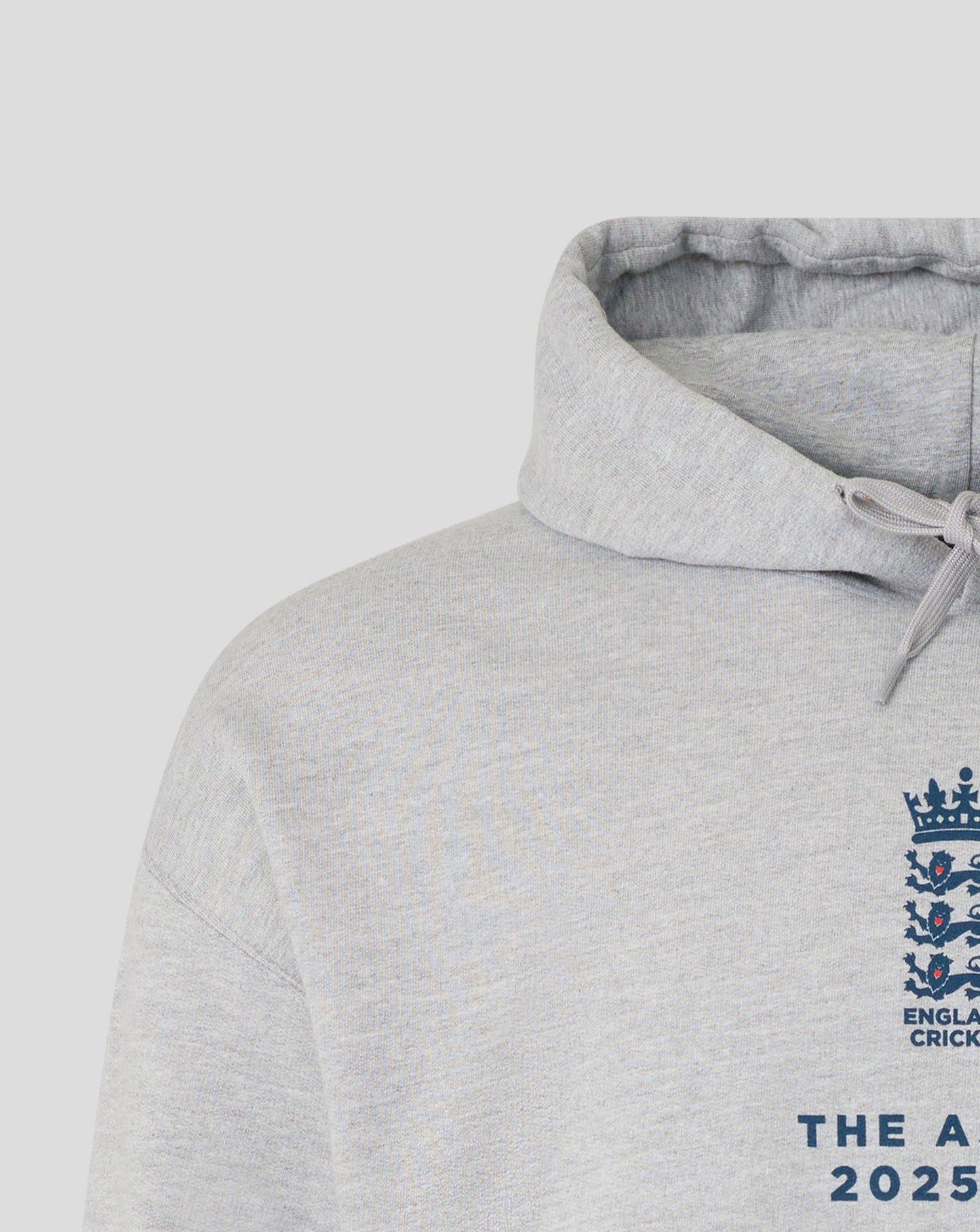 Close-up of light grey Ashes Tour hoodie showing hood and drawstring