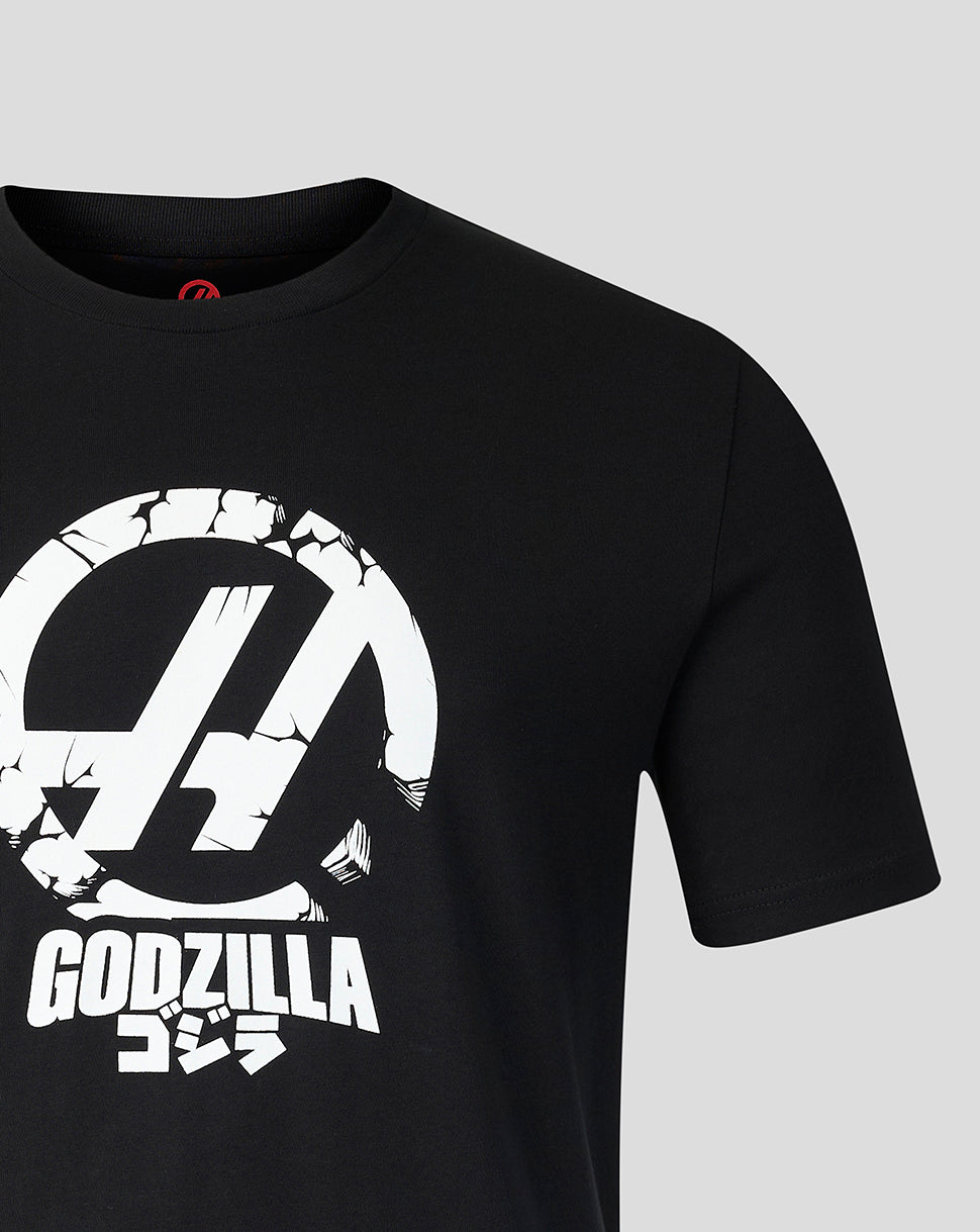 Detail of the front graphic on the black Godzilla Tokyo Haas tee with a prominent circular motif and GODZILLA text