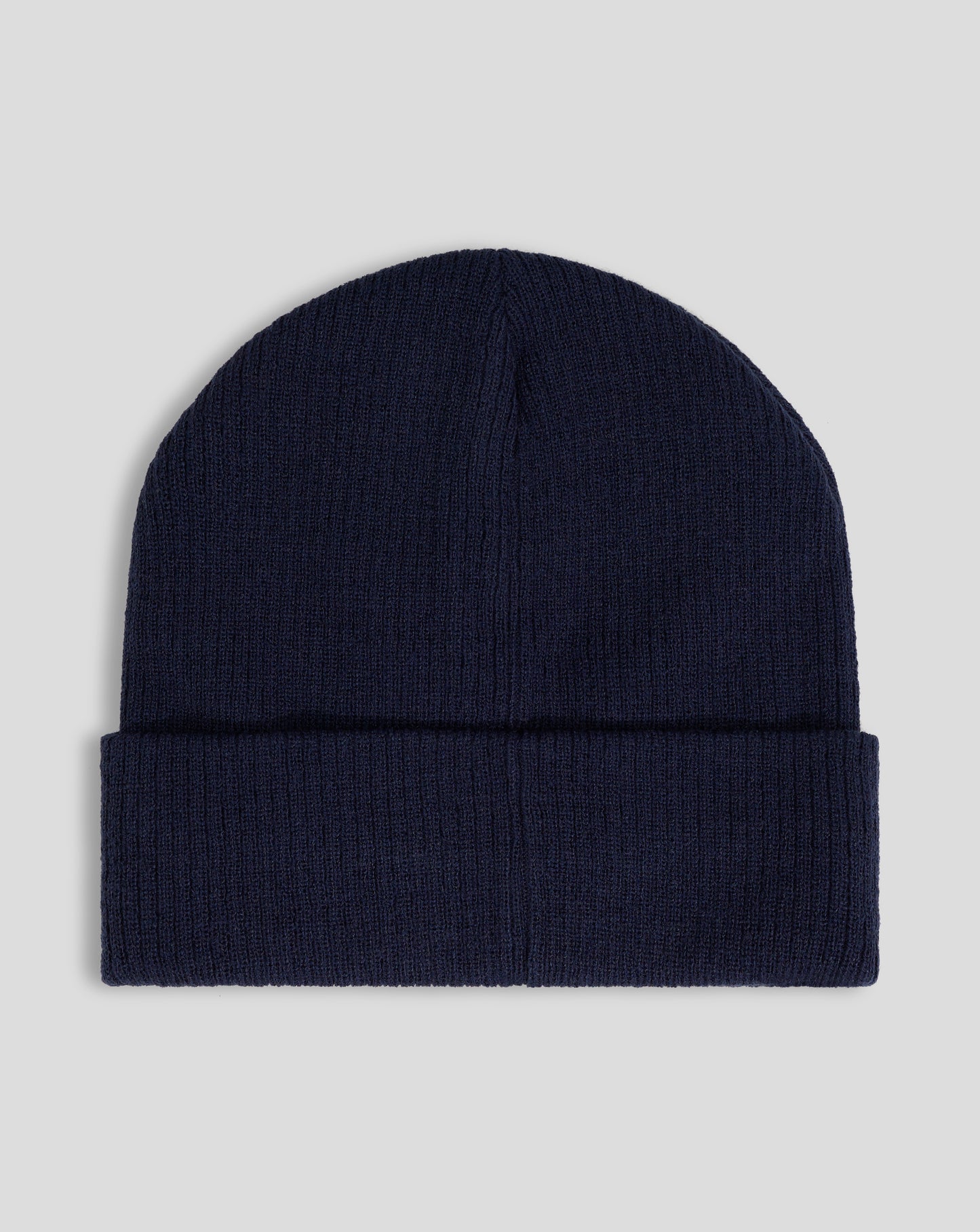 Navy ribbed knit beanie with folded cuff and white Castore logo embroidery.