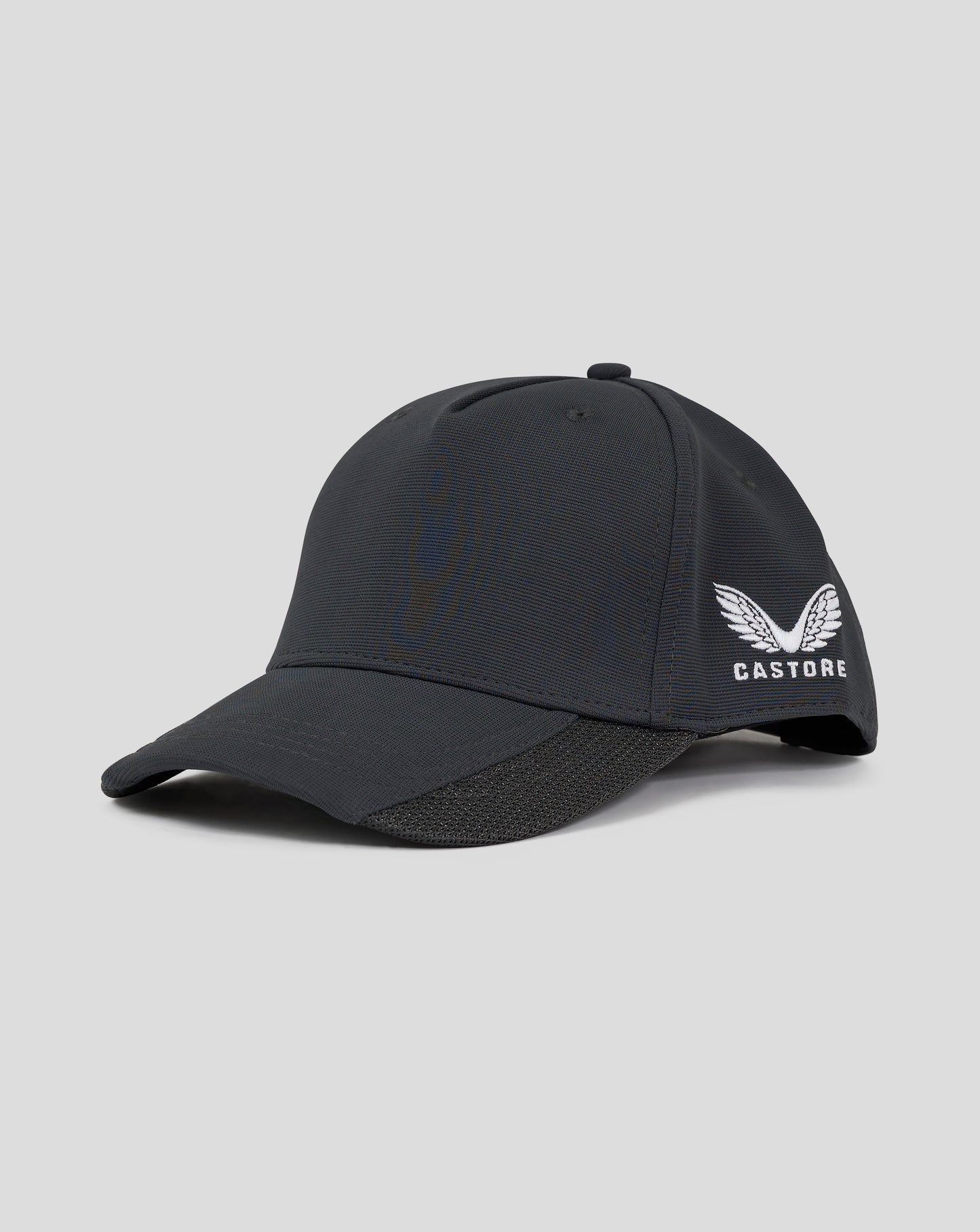 Side view of dark slate Castore 5 panel cap with embroidered logo and snap closure