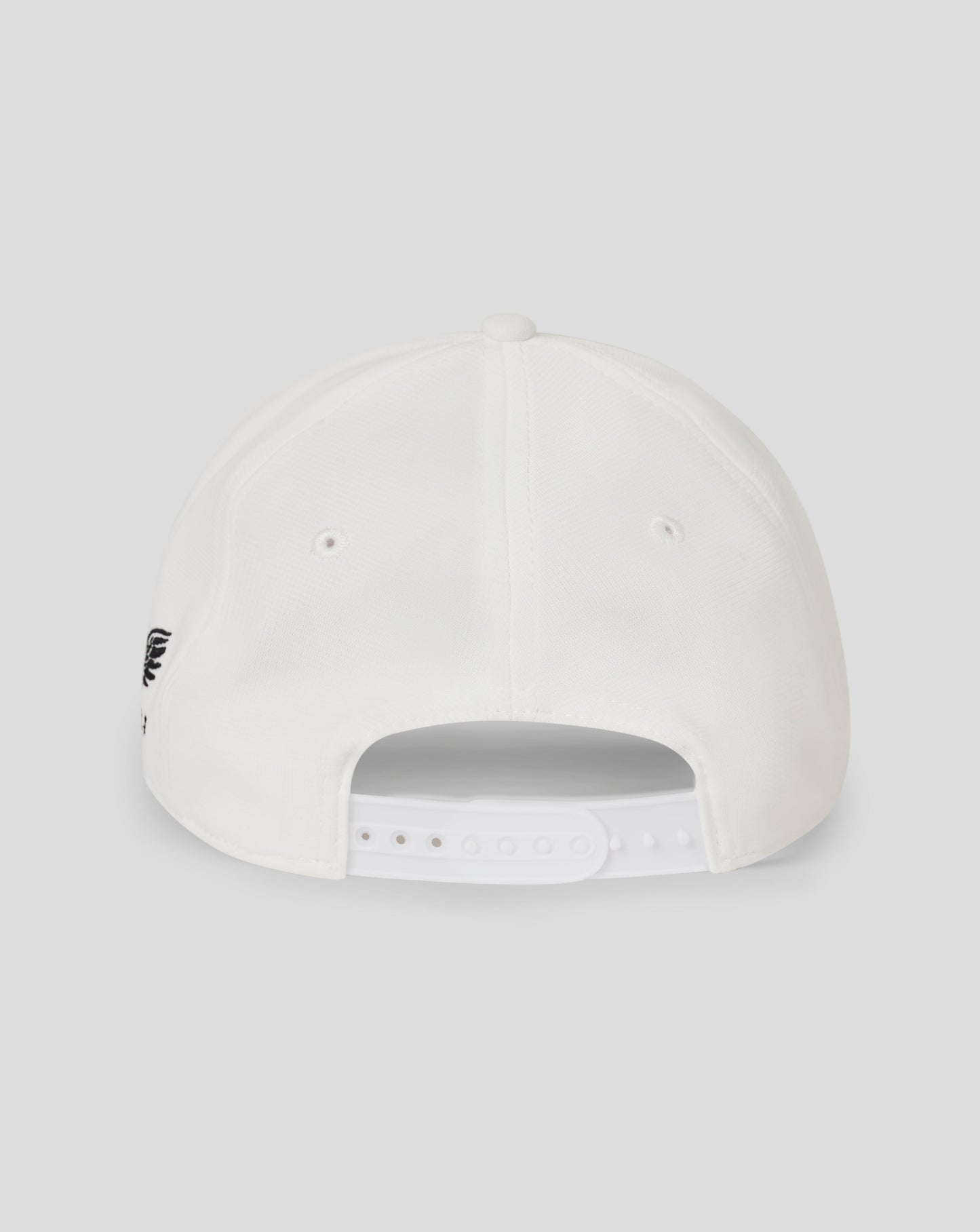Back view of Brilliant White Performance Cap with mesh peak panels, plastic snap closure and Castore logo