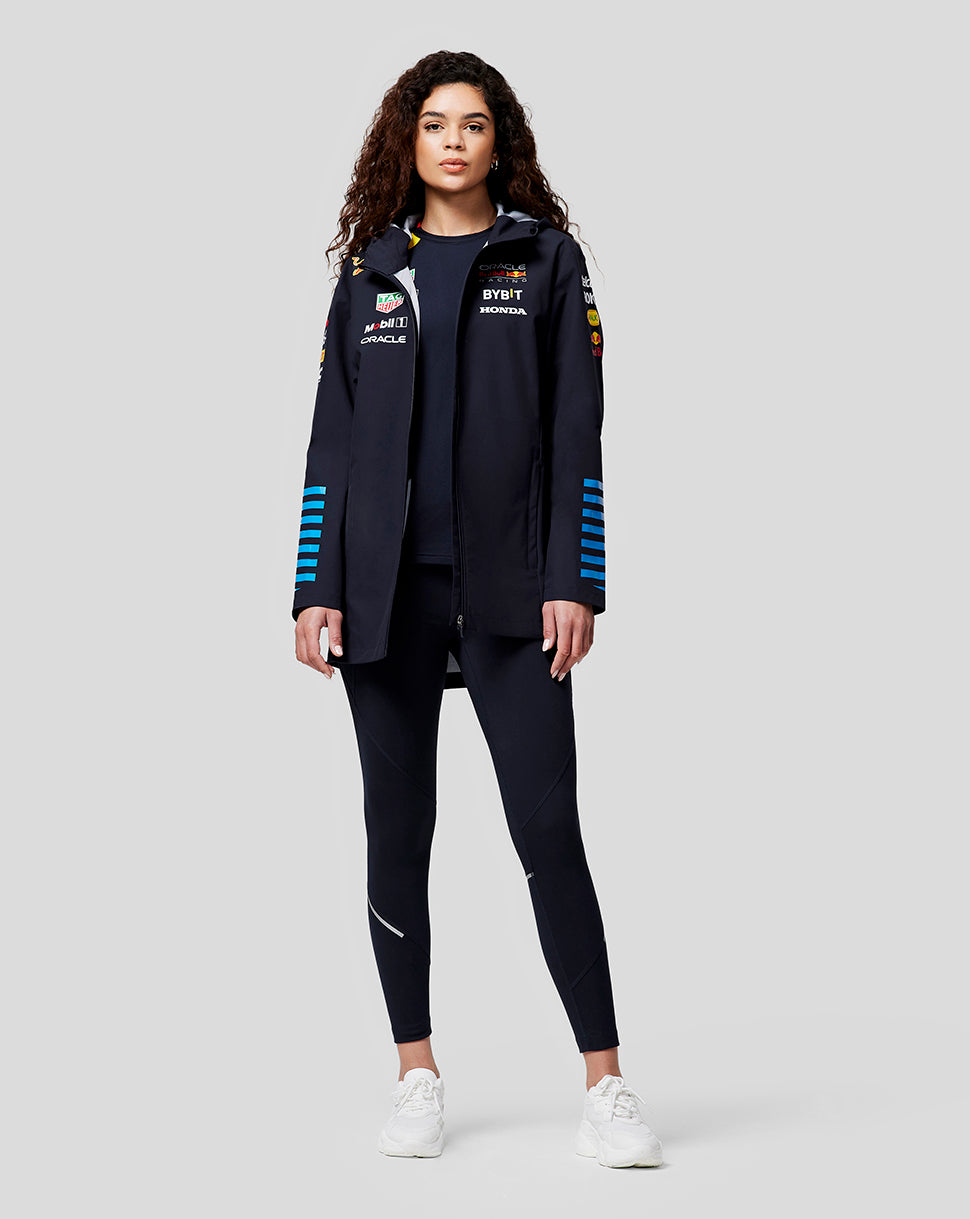 Navy water resistant jacket with Oracle Red Bull Racing logos on the chest and sleeves worn by a model.