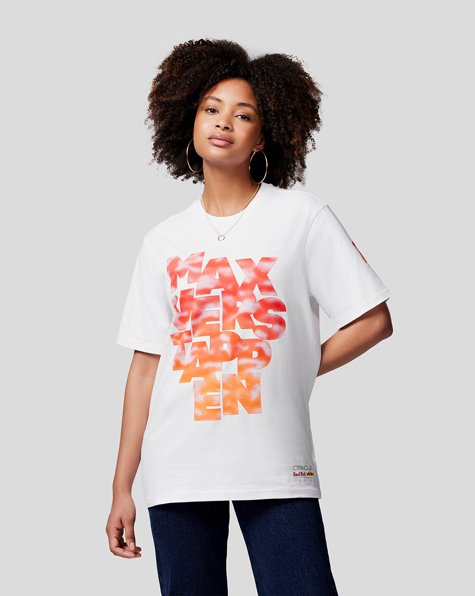 Model wearing white Max Expression T shirt with bold orange graphic across the front
