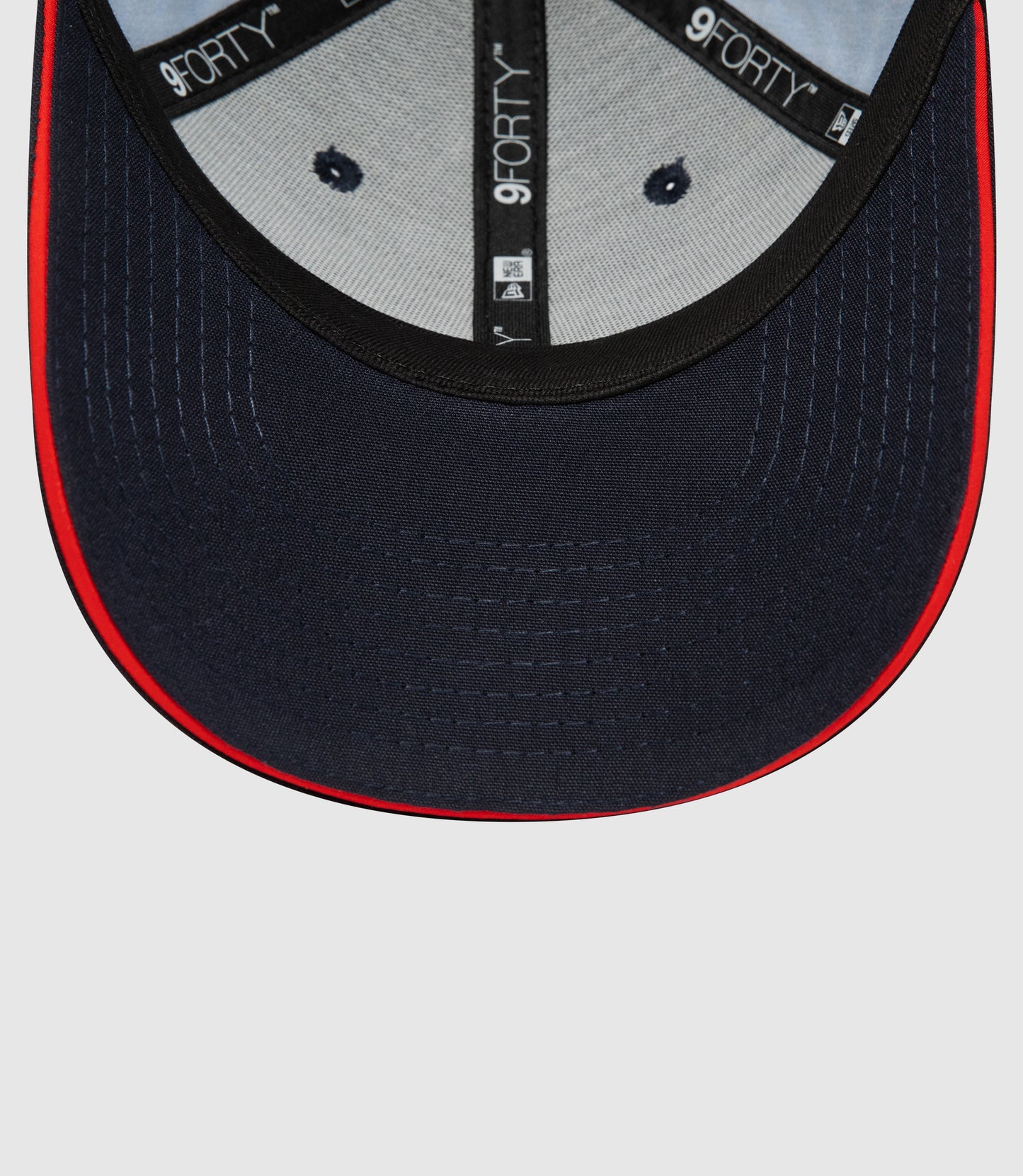Navy 9FORTY youth cap by New Era with Oracle Red Bull Racing patch on the front and curved visor