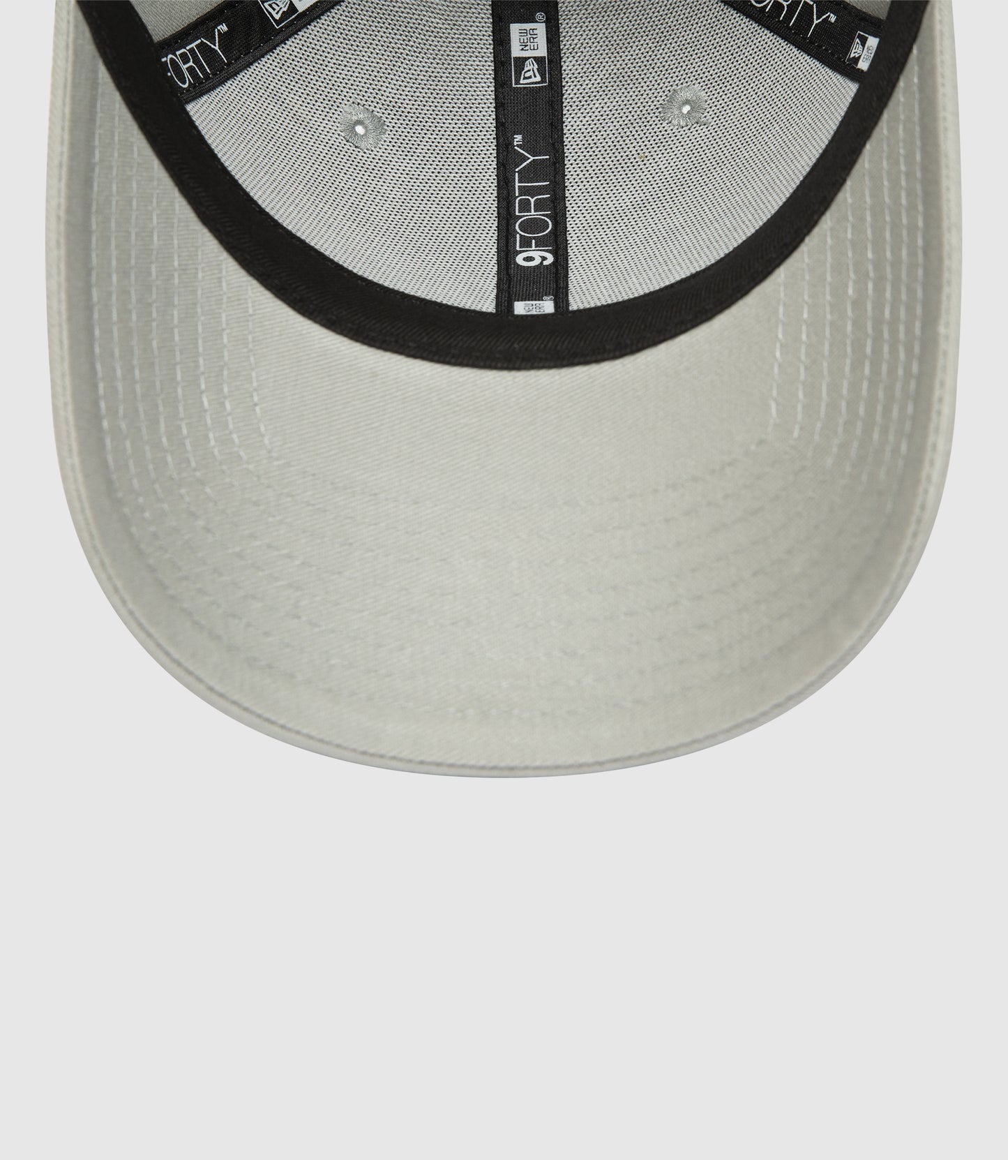 Inside view of a grey Oracle Red Bull Racing 9FORTY cap with black trim and New Era branding