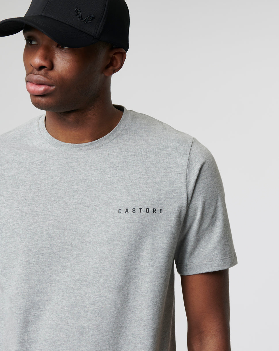 Male model wearing light grey Sharkskin Marl Capsule Recovery T Shirt with Castore logo on the chest