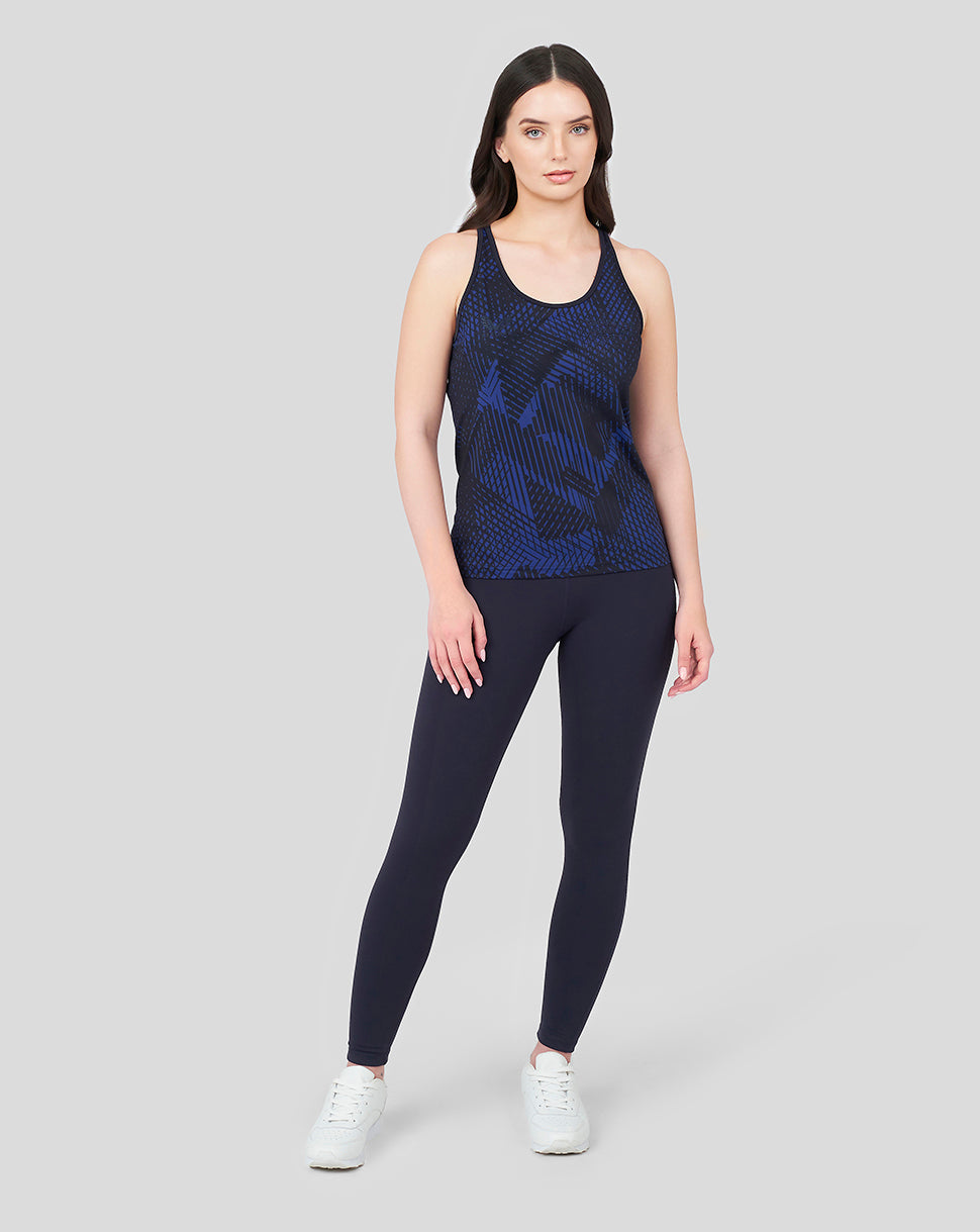 Female model wearing the Oracle Red Bull Racing Night Sky tank top with round neckline and blue pattern