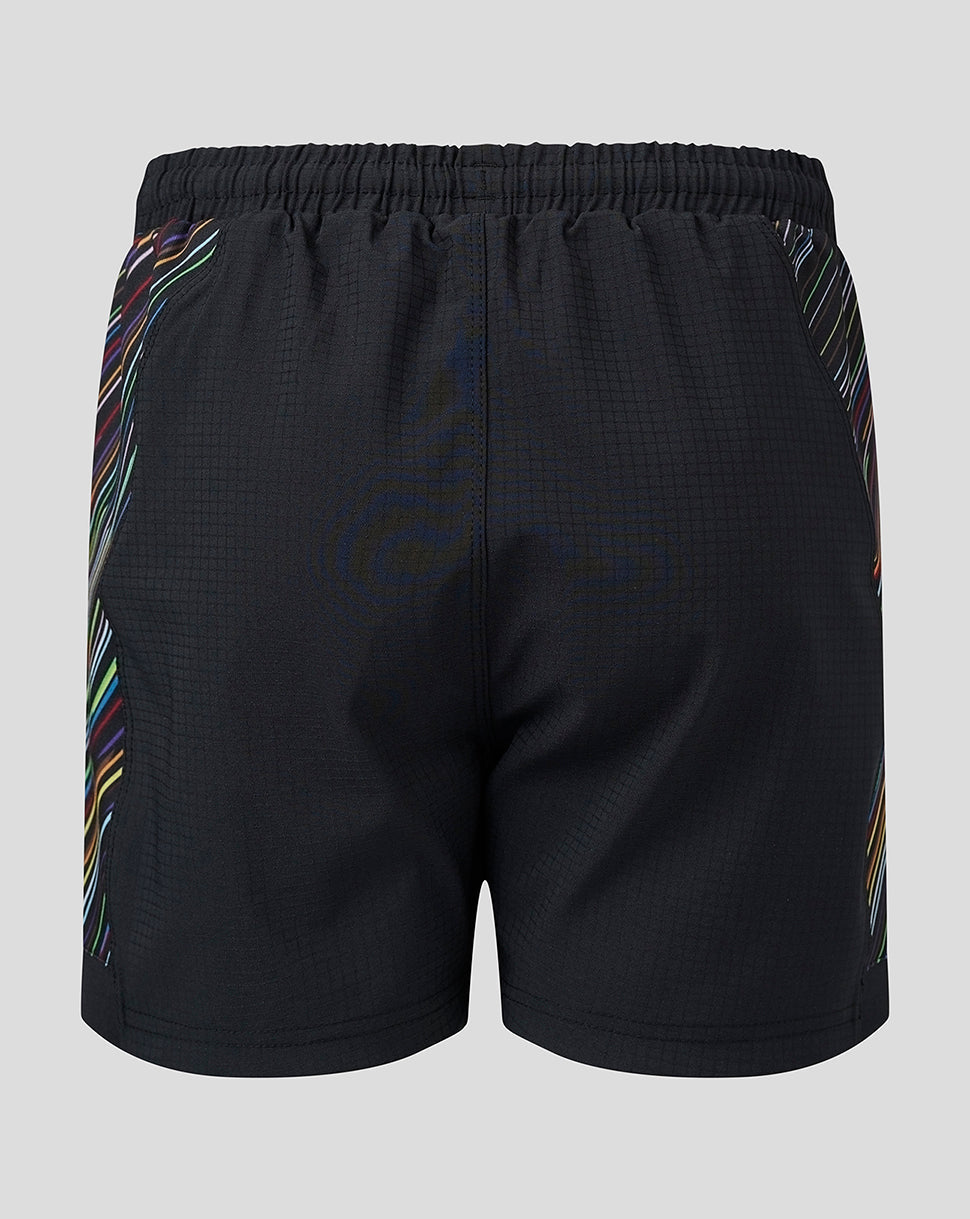 Back view of Youth 23/24 Replica Pride Shorts with rainbow trim along the sides on black fabric