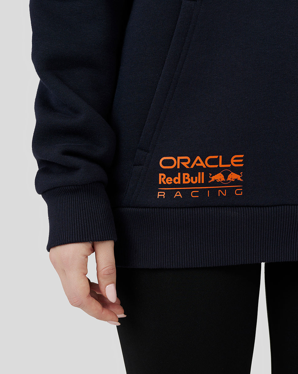 Close-up of navy hoodie hem with orange Oracle Red Bull Racing logo