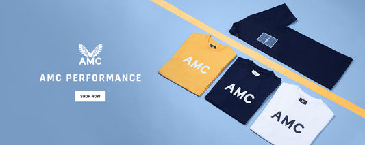 AMC Performance tennis clothing collection on blue background showing folded yellow navy and white tees