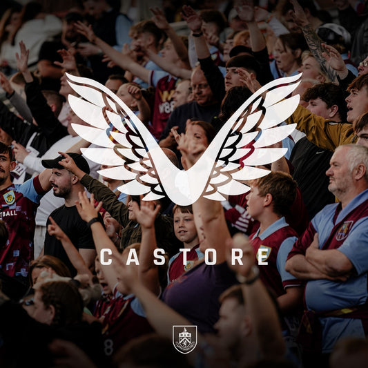 Crowd cheers at a Castore Apex event with a large white winged logo overlay