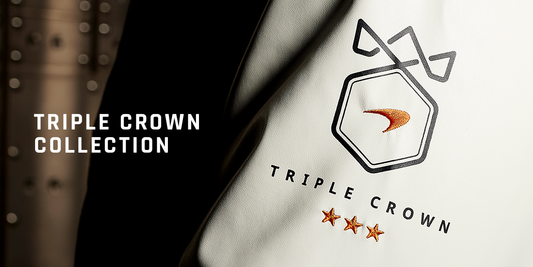 White garment with McLaren Triple Crown Collection emblem visible on a dark background