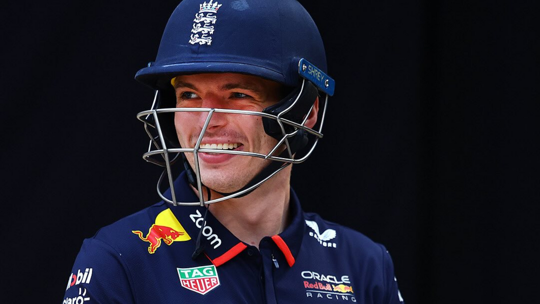 England cricket player in a blue helmet with the three lions crest and Red Bull Racing branding on the jersey