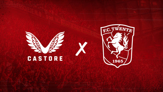 Castore logo with wings and FC Twente crest on a red patterned backdrop announcing a multi-season partnership.