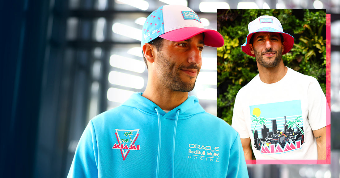 Two male models wear the Miami collection, featuring a turquoise hoodie with Oracle Red Bull Racing logo and a pink and blue cap
