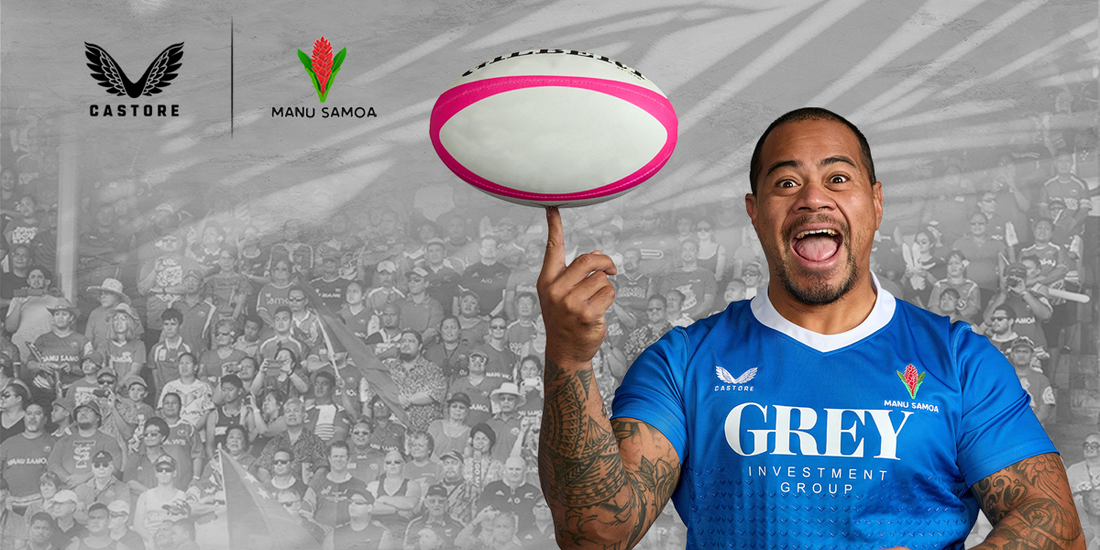 Rugby player balances a pink and white ball on one finger in front of a cheering crowd with Castore and Manu Samoa logos.