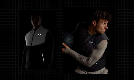 Two athletes in reflective dark activewear from The Light Collection against a black grid backdrop