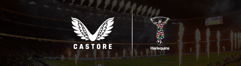 Castore and Harlequins logos displayed on a stadium banner with celebratory pyrotechnics.