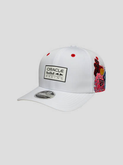 White cap featuring Oracle Red Bull Racing patch on the front and colorful side embroidery with waves and a curved brim