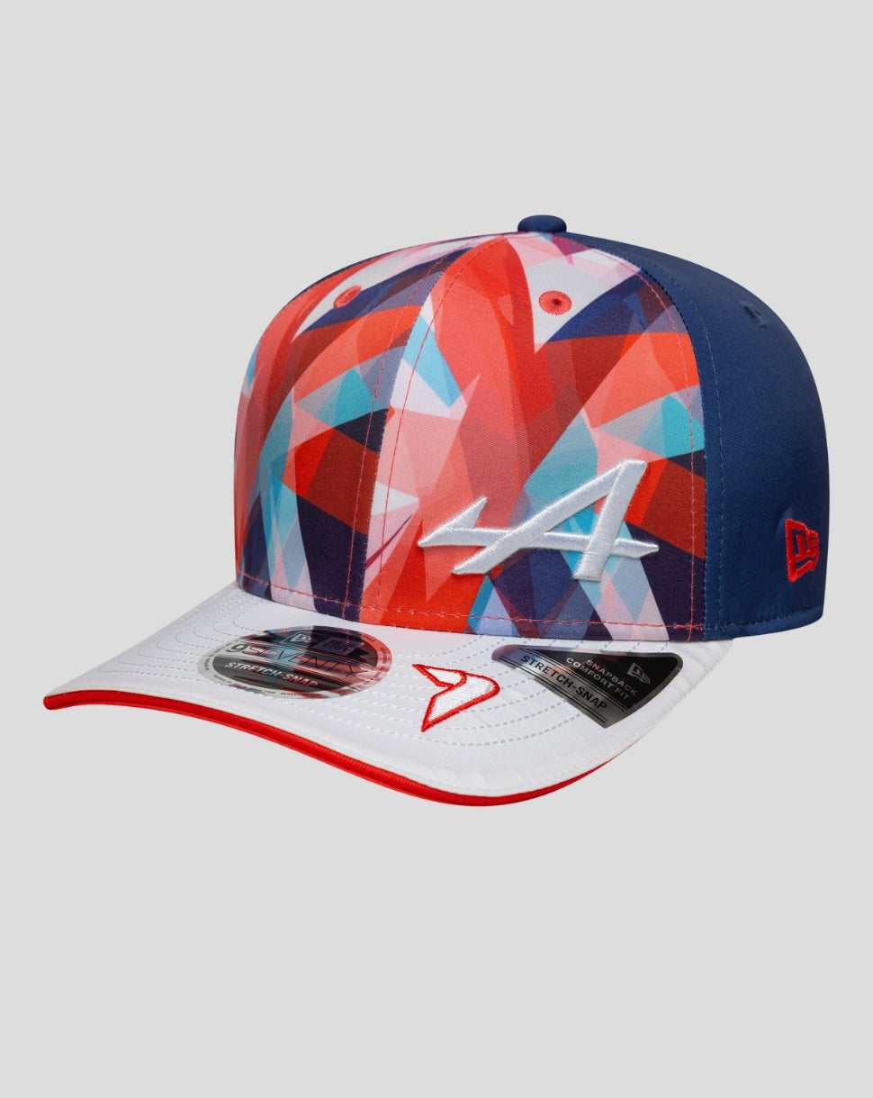 Geometric multicolor front panels cap with a white embroidered A logo, blue back panel and white brim with red trim.