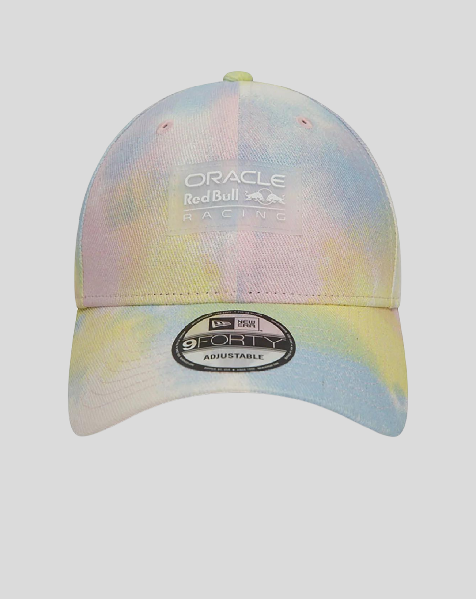 Front view of pastel tie-dye cap featuring Oracle Red Bull Racing logo on the crown and curved brim.