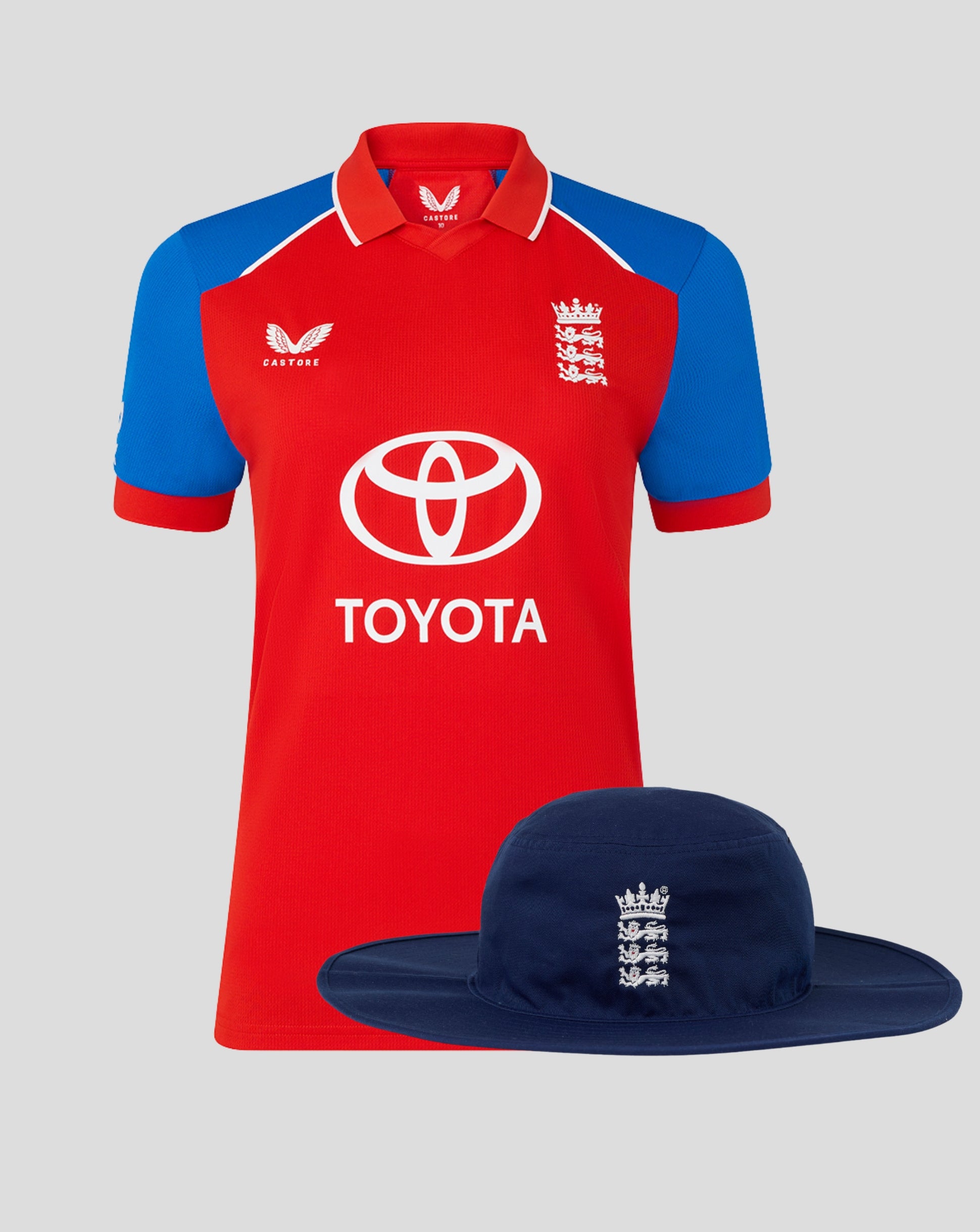 England 26/27 women's T20 shirt in red with blue sleeves paired with a navy brim hat featuring the crest