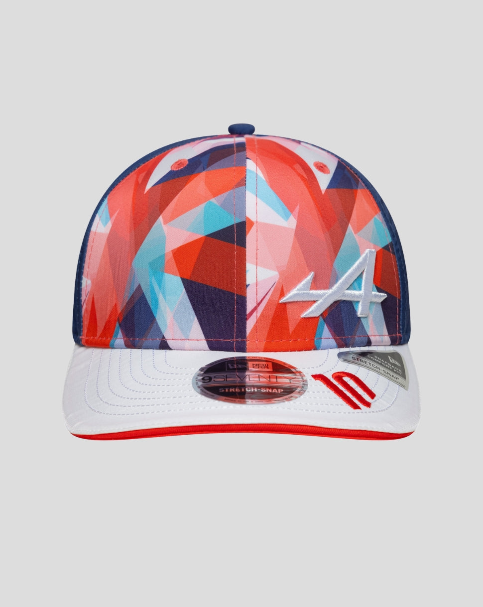 Front view of a white New Era 9Seventy cap with a vibrant geometric crown, white brim with red edge and a white A logo