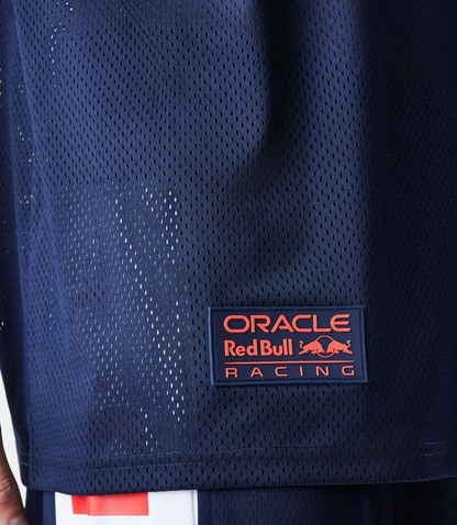 Male model wearing a navy blue oversized mesh T shirt with Oracle Red Bull Racing branding