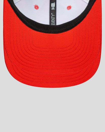 Close-up of a red 9Seventy stretch snap cap with curved brim and visible stitching details