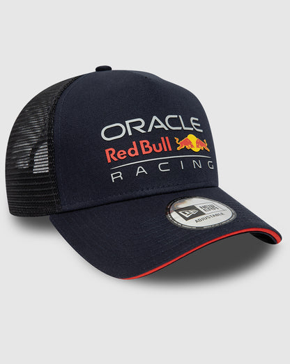 Angled view of navy Oracle Red Bull Racing trucker cap showing mesh back and red adjustable strap