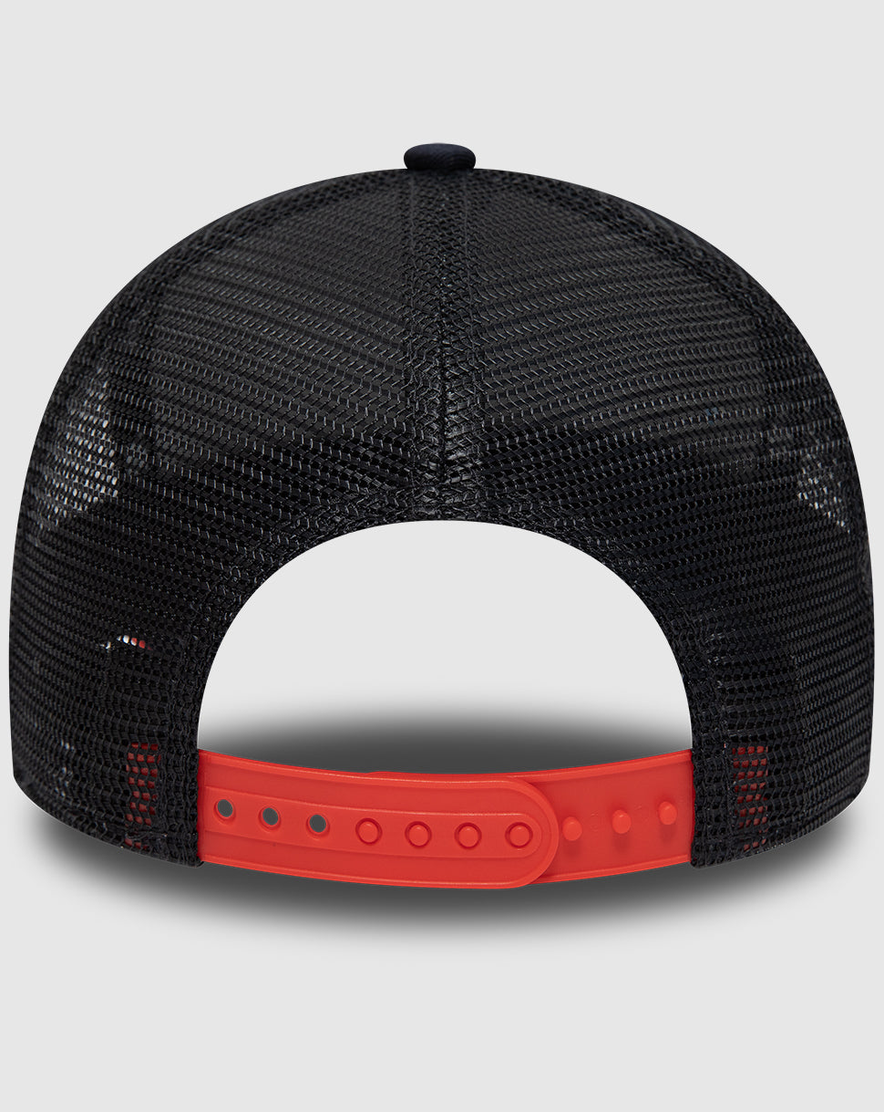 Back view of navy mesh trucker cap with bright red plastic adjustable strap