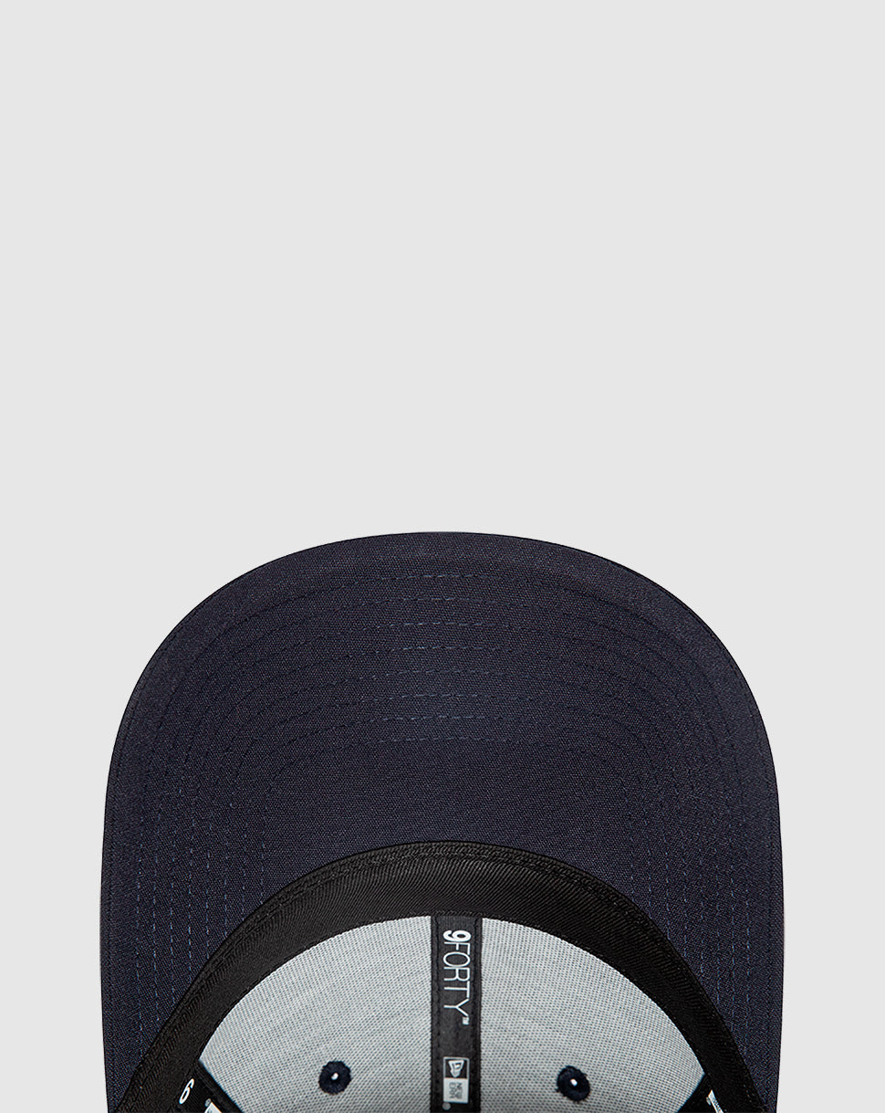 Navy Oracle Red Bull Racing essential trucker cap by New Era, close up of brim and front panel.