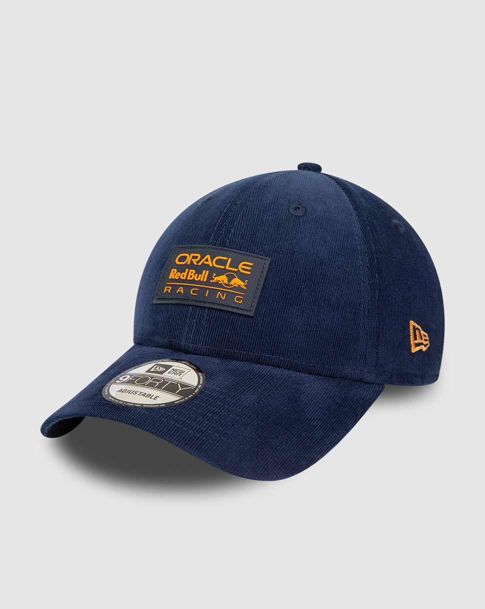 Navy Oracle Red Bull Racing 9FORTY cap with orange front patch and New Era flag on left, curved visor and strapback