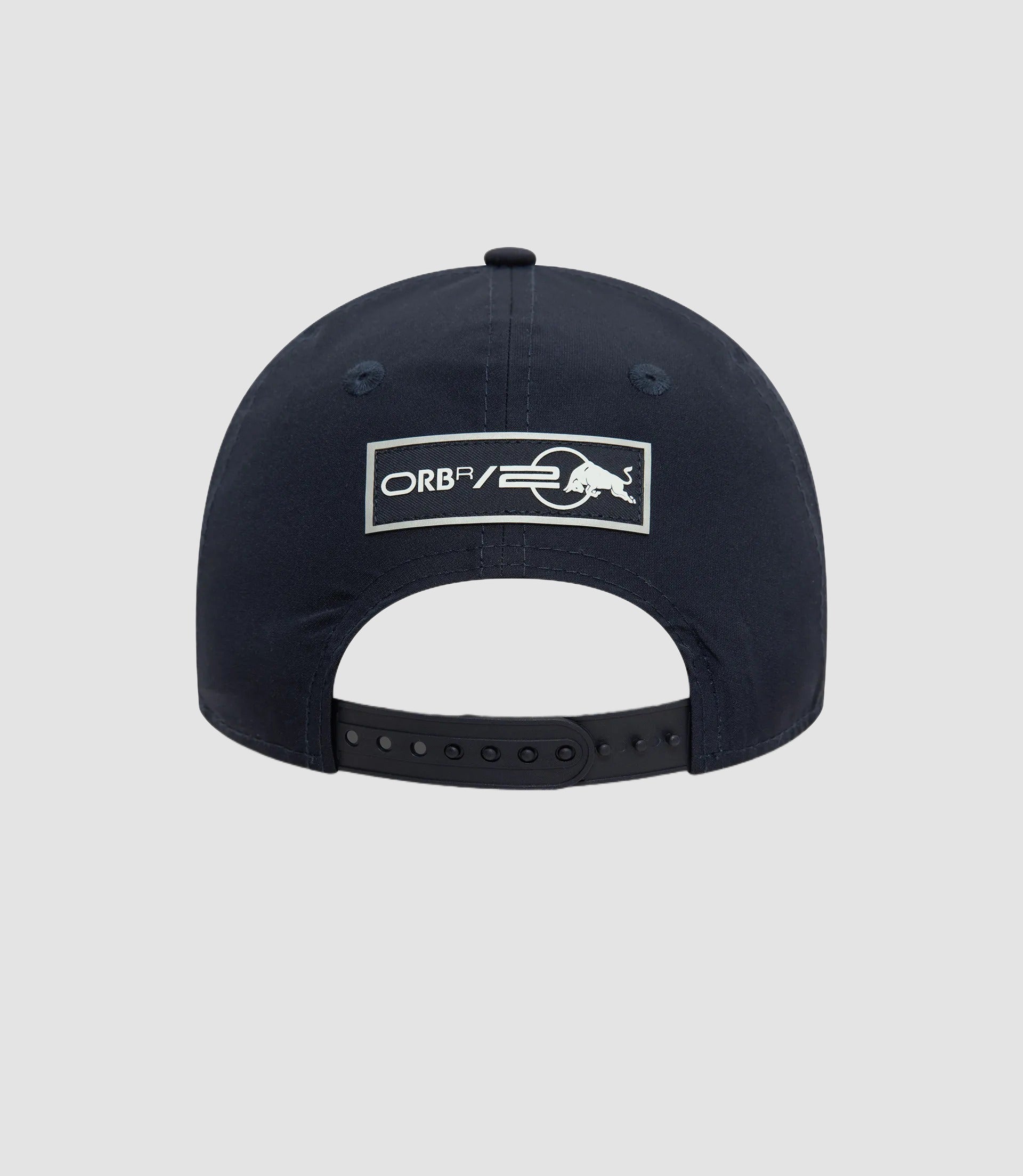 Back view of navy Oracle Red Bull Racing 9Forty cap with adjustable strap and red trim on the brim