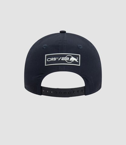 Back view of navy Oracle Red Bull Racing 9Forty cap with adjustable strap and red trim on the brim