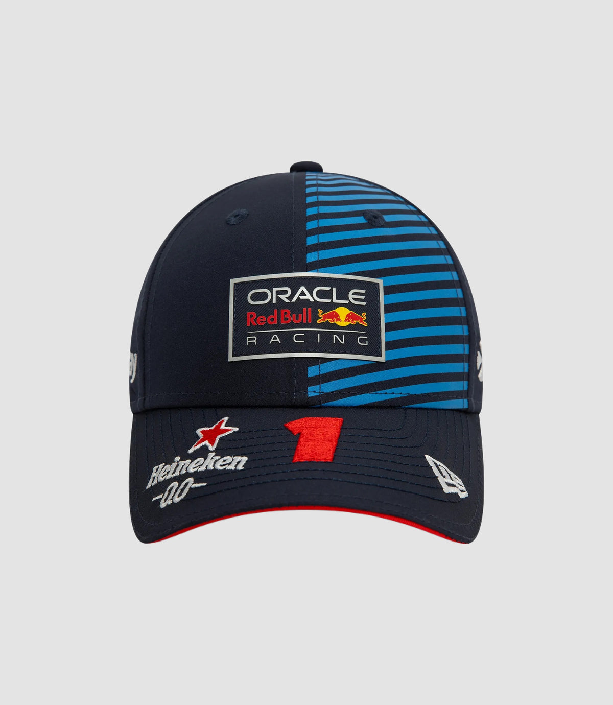Side angle of the navy cap showing blue striped crown and the Oracle Red Bull Racing patch on the front