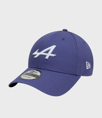 Close up of New Era Alpine 9Forty cap in dark blue with white embroidered logo on crown.