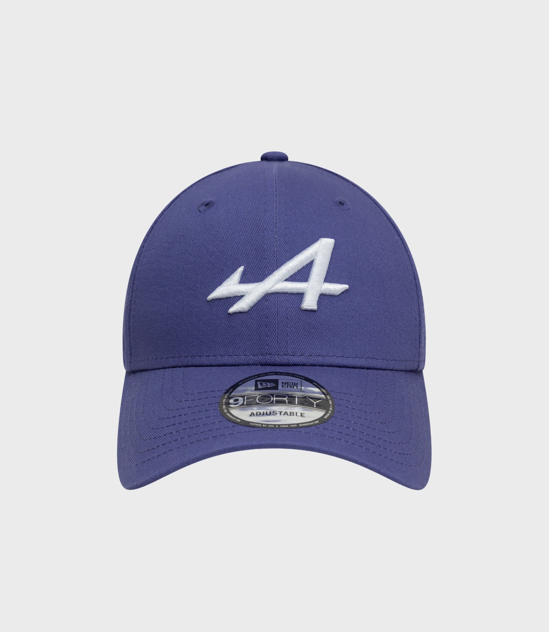 Front view of New Era Alpine 9Forty cap in dark blue with white front embroidery and brim sticker.