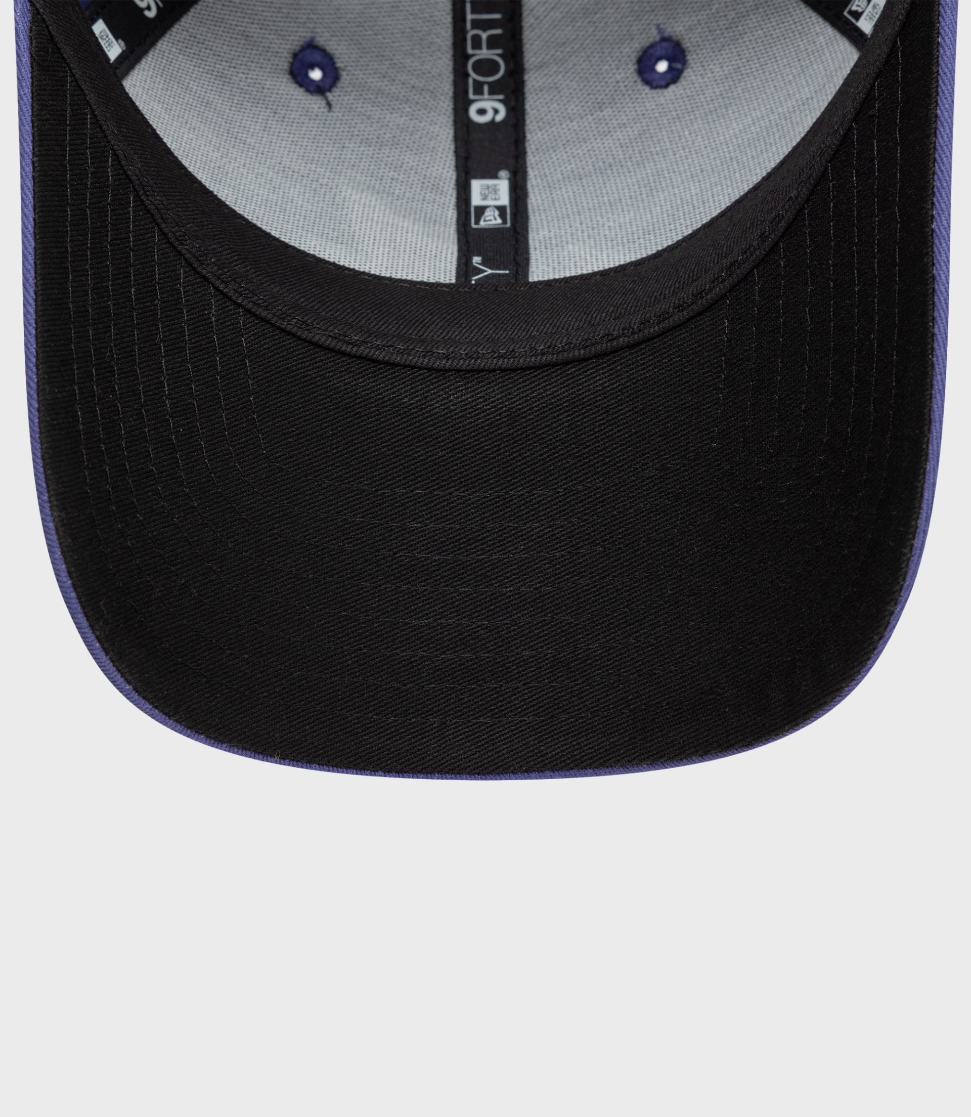 Inside view of the cap showing grey crown lining and 9Forty branding along the center seam