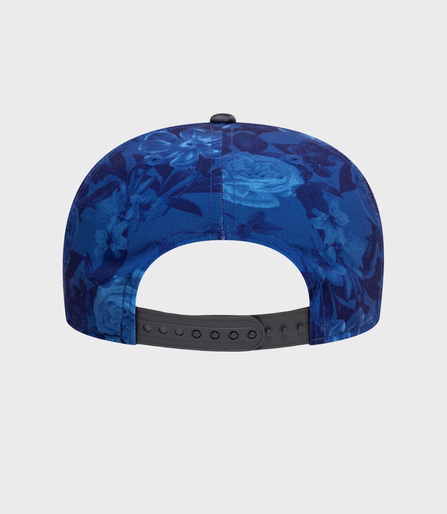 Front view of navy floral cap with top button and curved brim