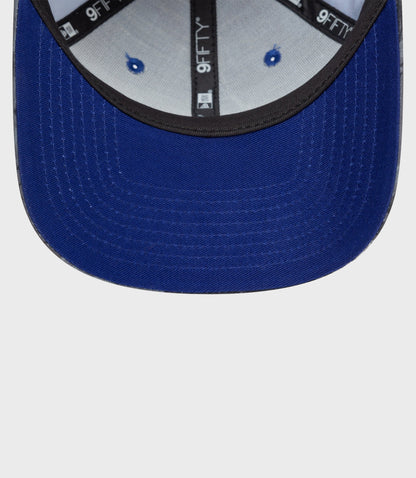 Back view of blue floral cap showing gray adjustable strap and inner crown details