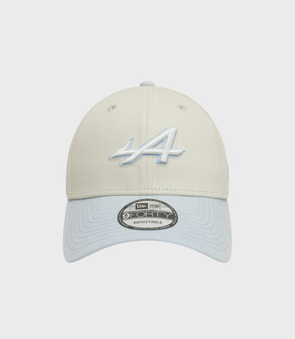 Front view of creme New Era Alpine Acid Wash 9Forty cap with light blue denim brim and pale blue embroidery on crown