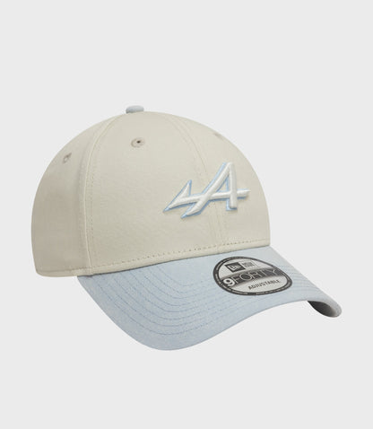 Back view of creme New Era Alpine Acid Wash 9Forty cap with adjustable denim strap and light blue brim